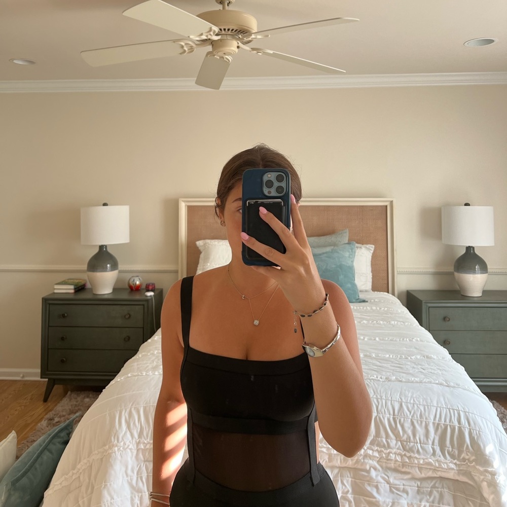 Black super down body suit from revolve size small